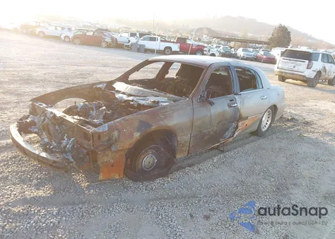 2000 Lincoln Town Car Executive из США, поврежденный, VIN 1LNHM81W0YY823982